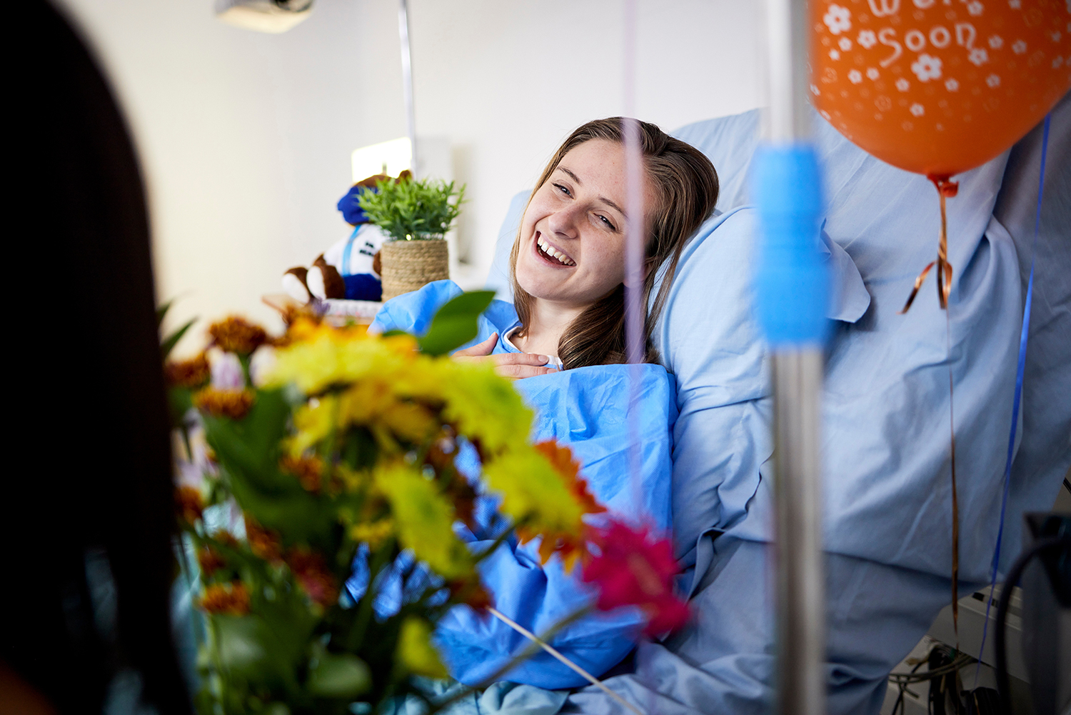 Flowers and gifts getting delivered to a hospital patient